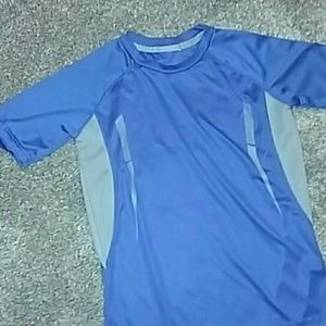 A little boys short sleeve Dri-Fit shirt